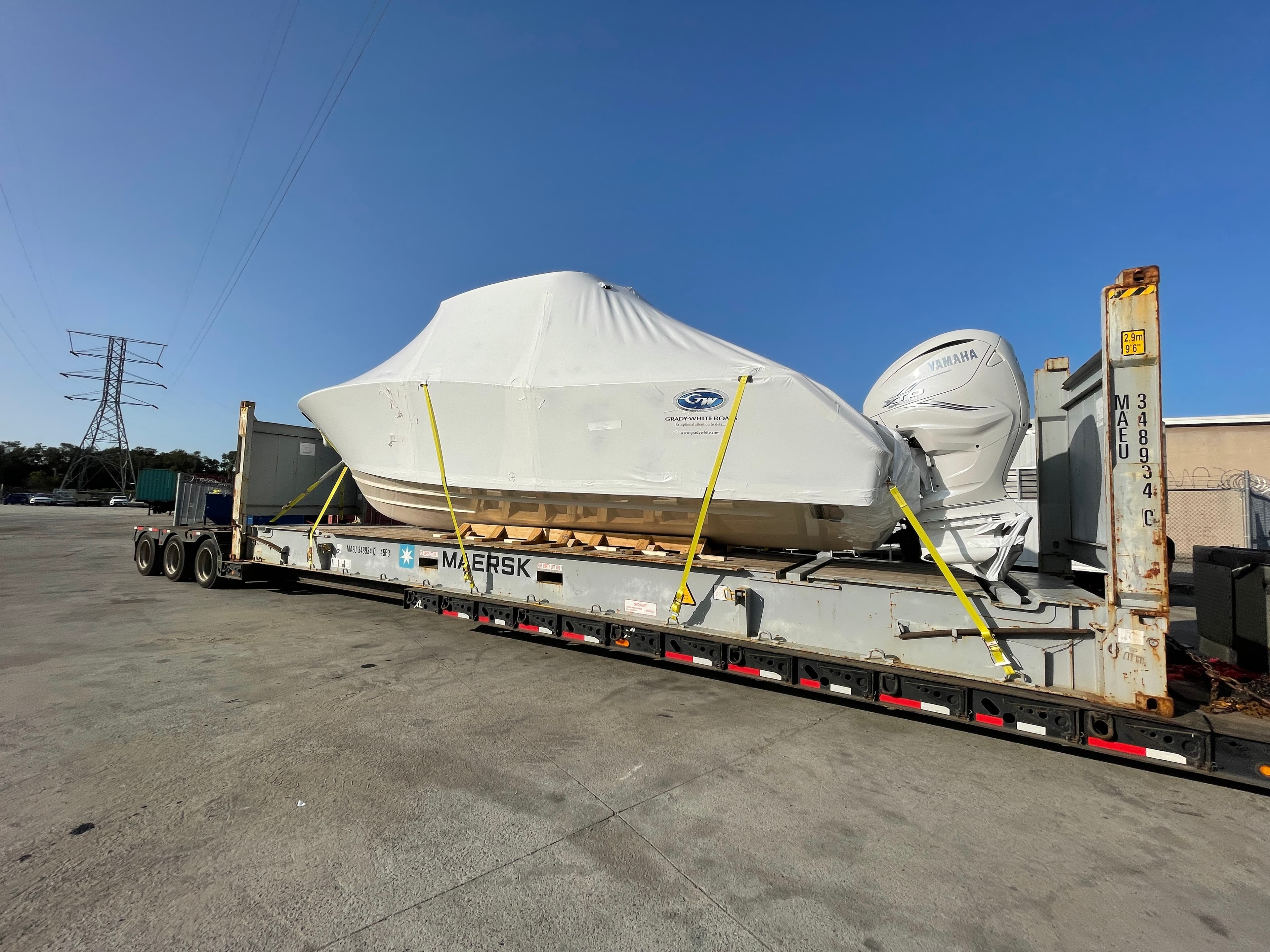 Over-height cargo on a lowboy trailer